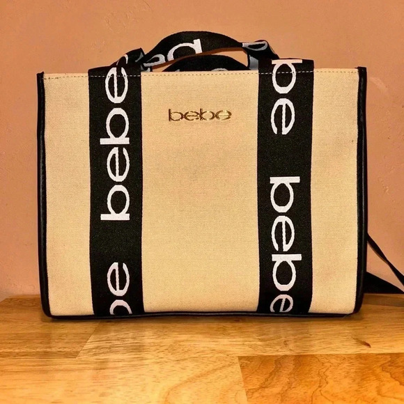 NWTS Bebe Hana Small Beige + Black Canvas Top Handle Crossbody With Logo Accents - Picture 1 of 7